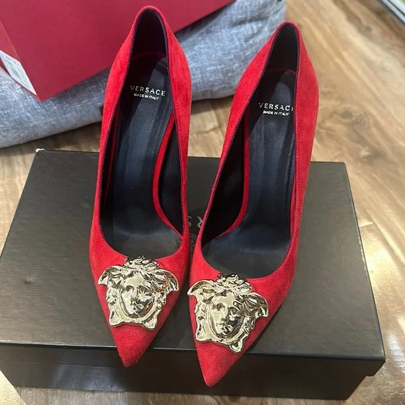 Red suede Versace Medusa head heels